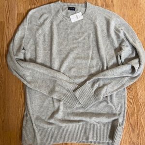 New with tags. Size large men’s sweater